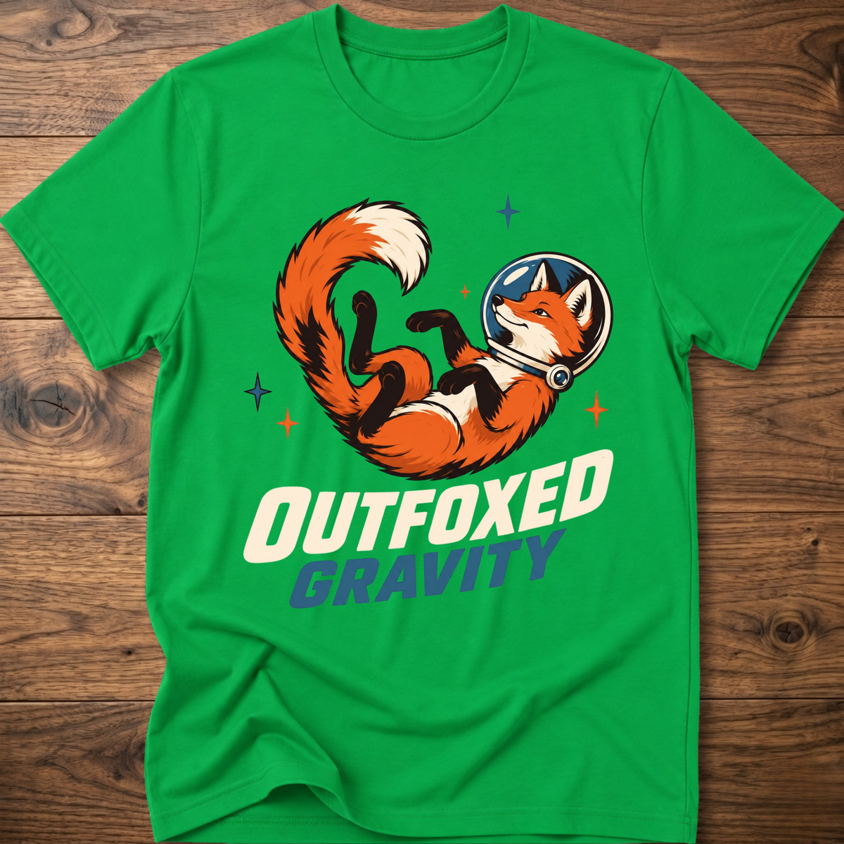 Outfoxed Gravity T-shirt in Irish green with orange fox gravity graphic and logo text