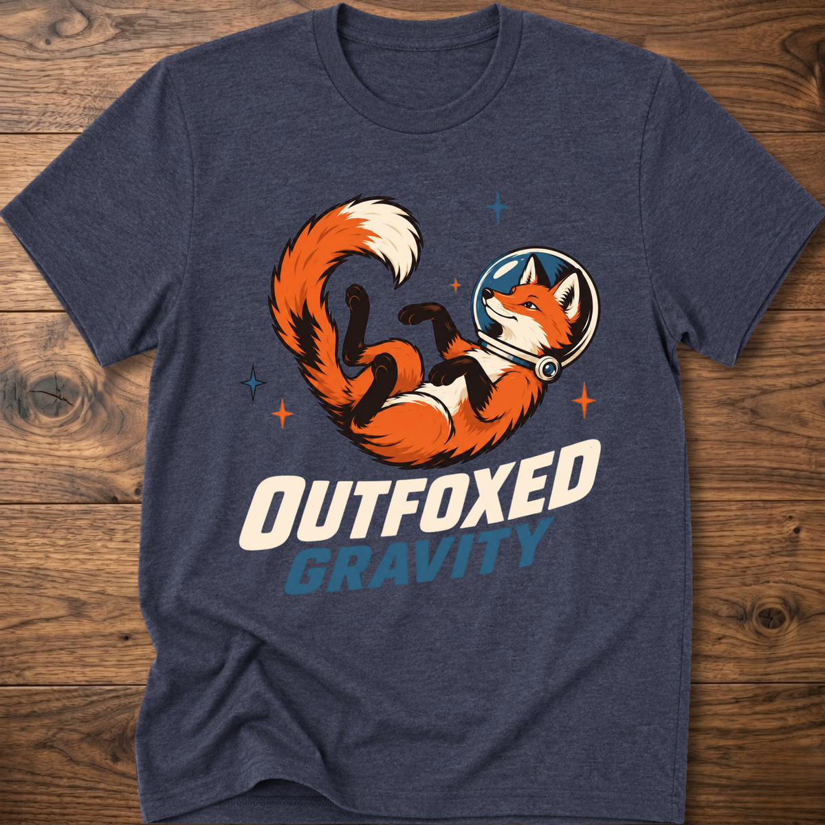 Outfoxed Gravity T-shirt in heather navy with orange fox gravity graphic and logo text