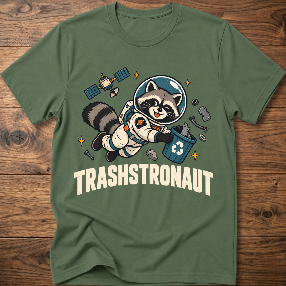 Military green T-shirt with raccoon astronaut graphic and TRASHSTRONAUT print