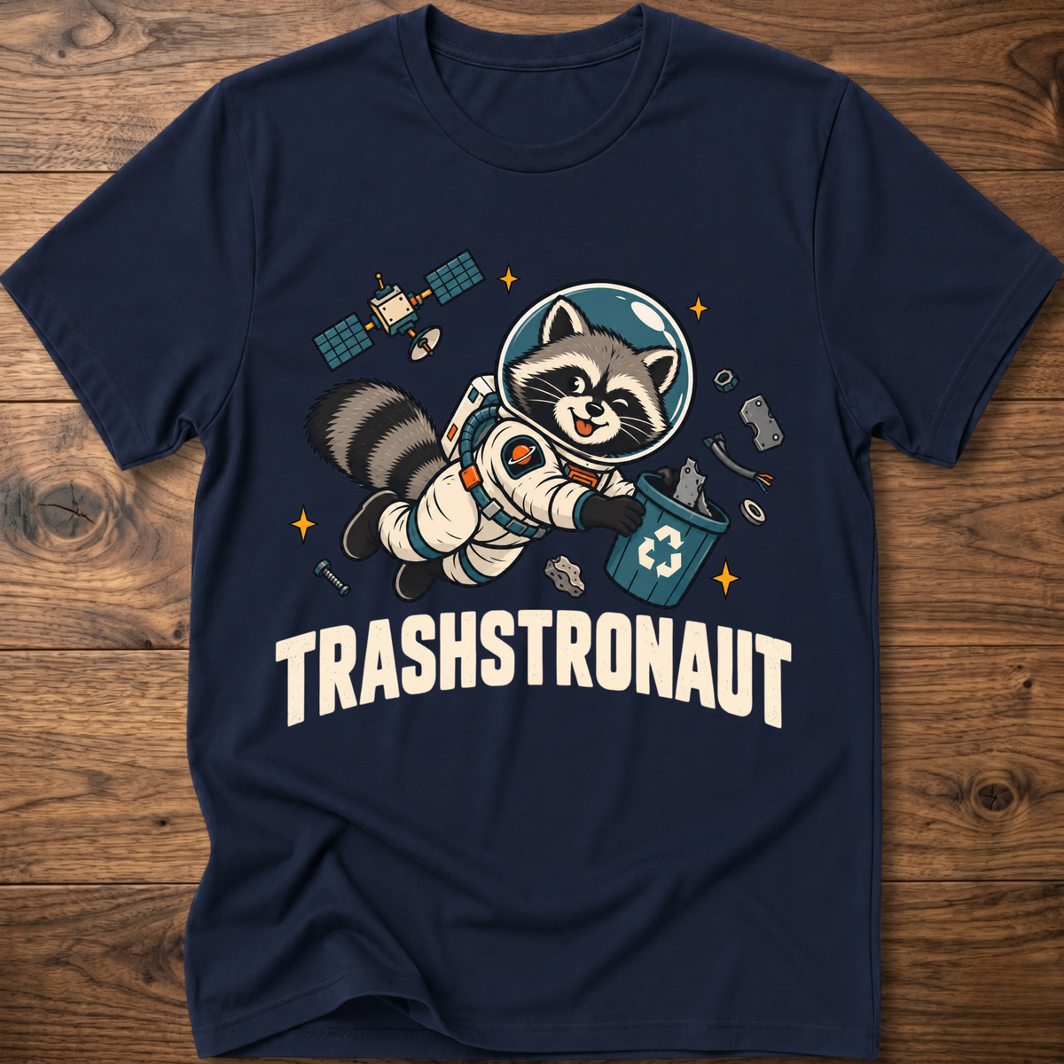 Dark navy crewneck T-shirt with raccoon astronaut graphic and TRASHSTRONAUT print