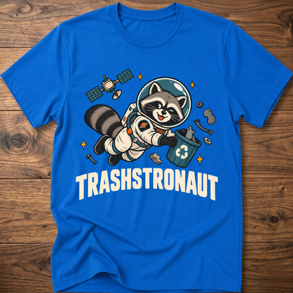 Royal blue T-shirt with raccoon astronaut graphic and TRASHSTRONAUT print