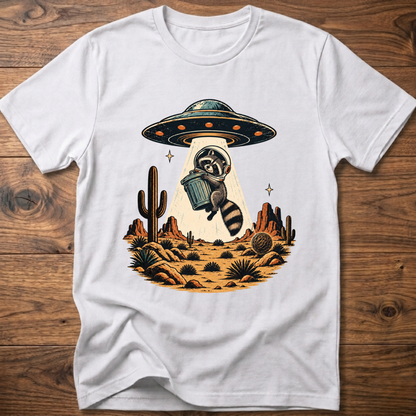 White crew-neck T-shirt with astronaut raccoon graphic, UFO, and desert cactus