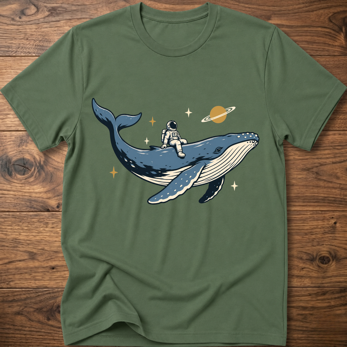 Military green T-shirt with astronaut riding space whale graphic