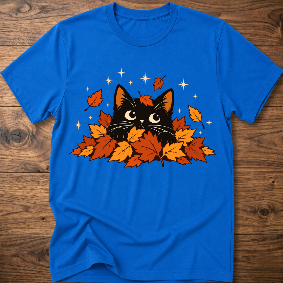 Royal blue cat T-shirt with black cat and orange autumn leaves graphic