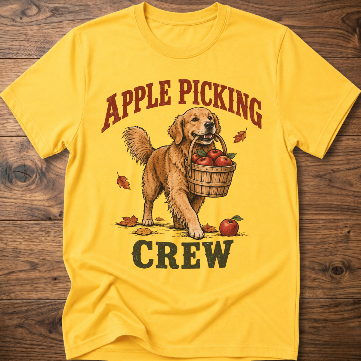 Yellow dog T-shirt with “Apple Picking Crew” graphic and apple basket