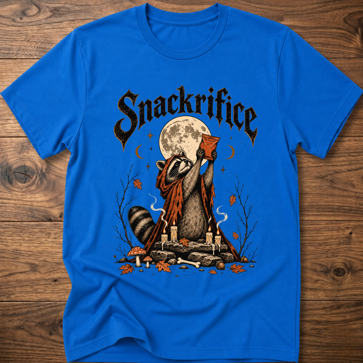 Royal blue crew-neck t-shirt with black 'Snackrifice' raccoon moon front graphic