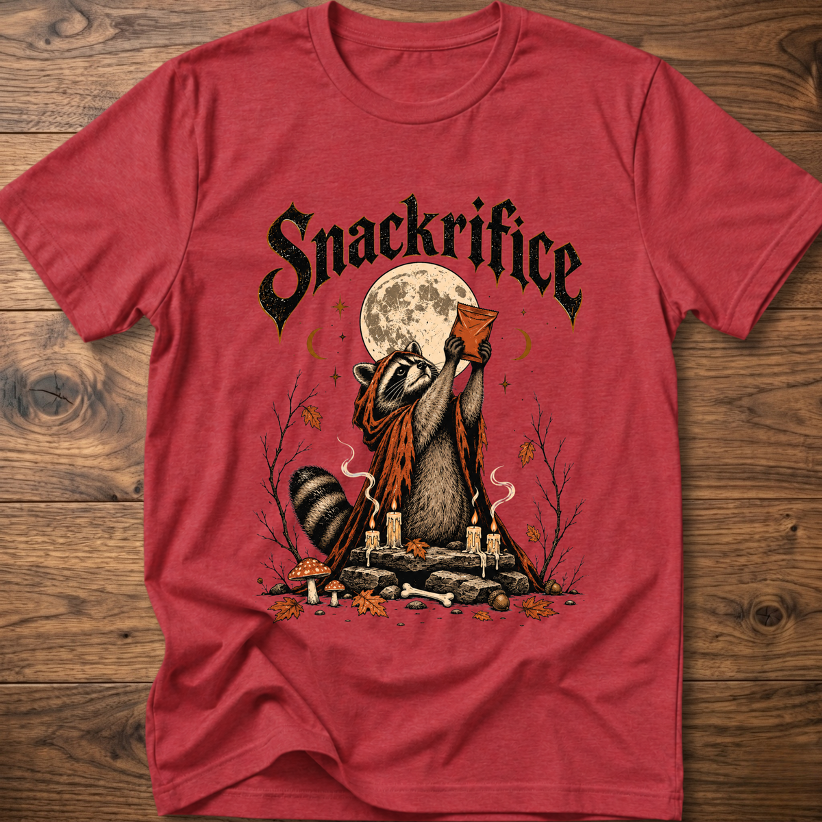 Red crew-neck t-shirt with black 'Snackrifice' raccoon moon front graphic