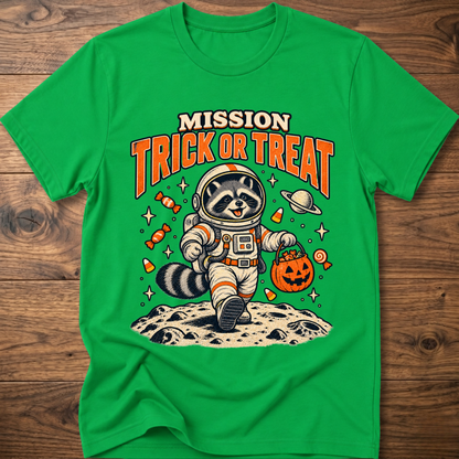 Green T-shirt with astronaut raccoon “MISSION TRICK OR TREAT” graphic