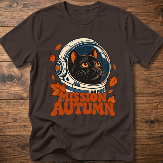 Dark brown cat astronaut graphic t-shirt with “Mission Autumn” and leaf accents