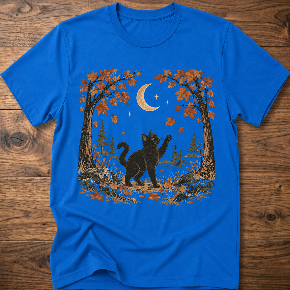 Royal blue crewneck cat graphic t-shirt with autumn leaves, moon, and forest scene print