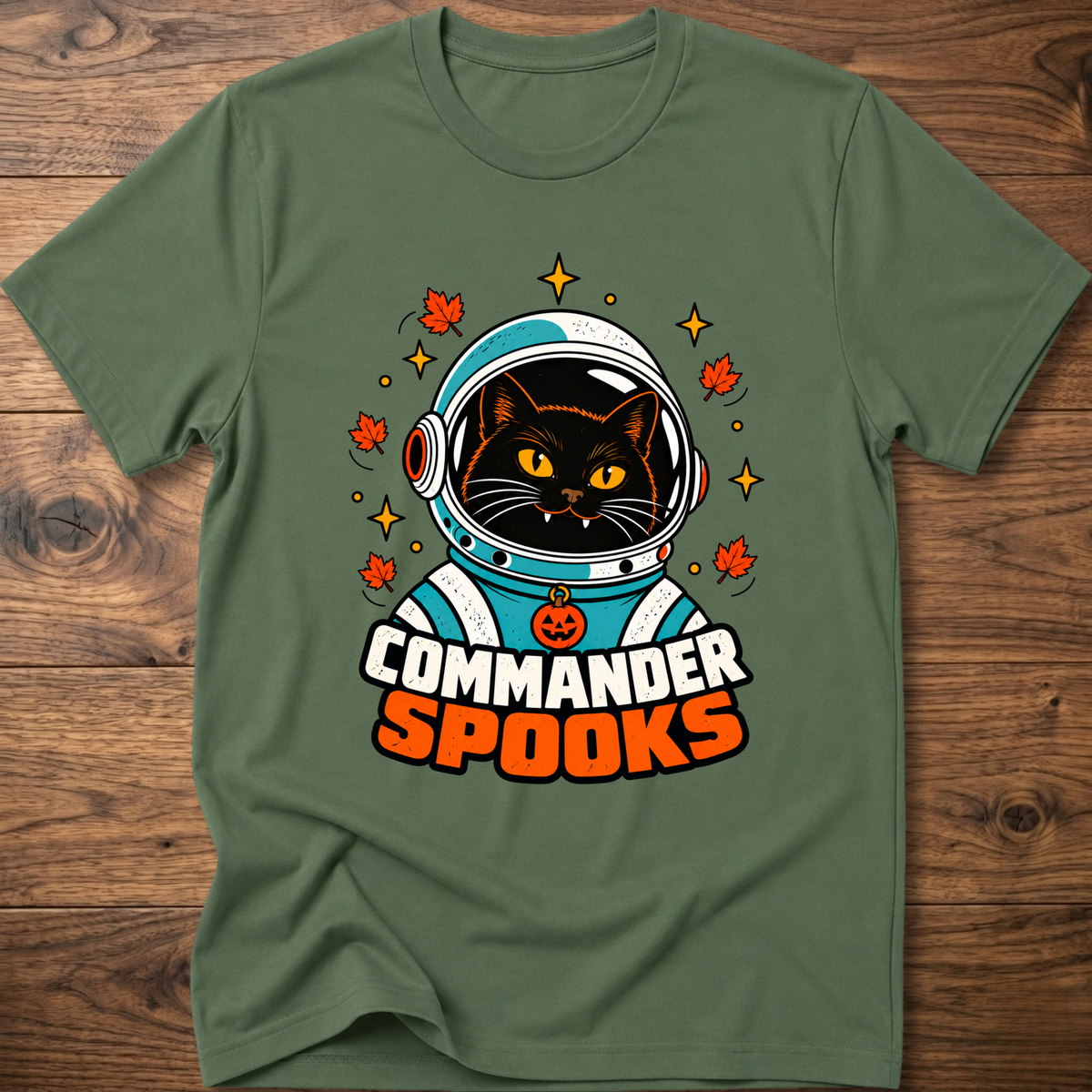 Military green crew-neck T-shirt with cat astronaut graphic and Halloween leaves.