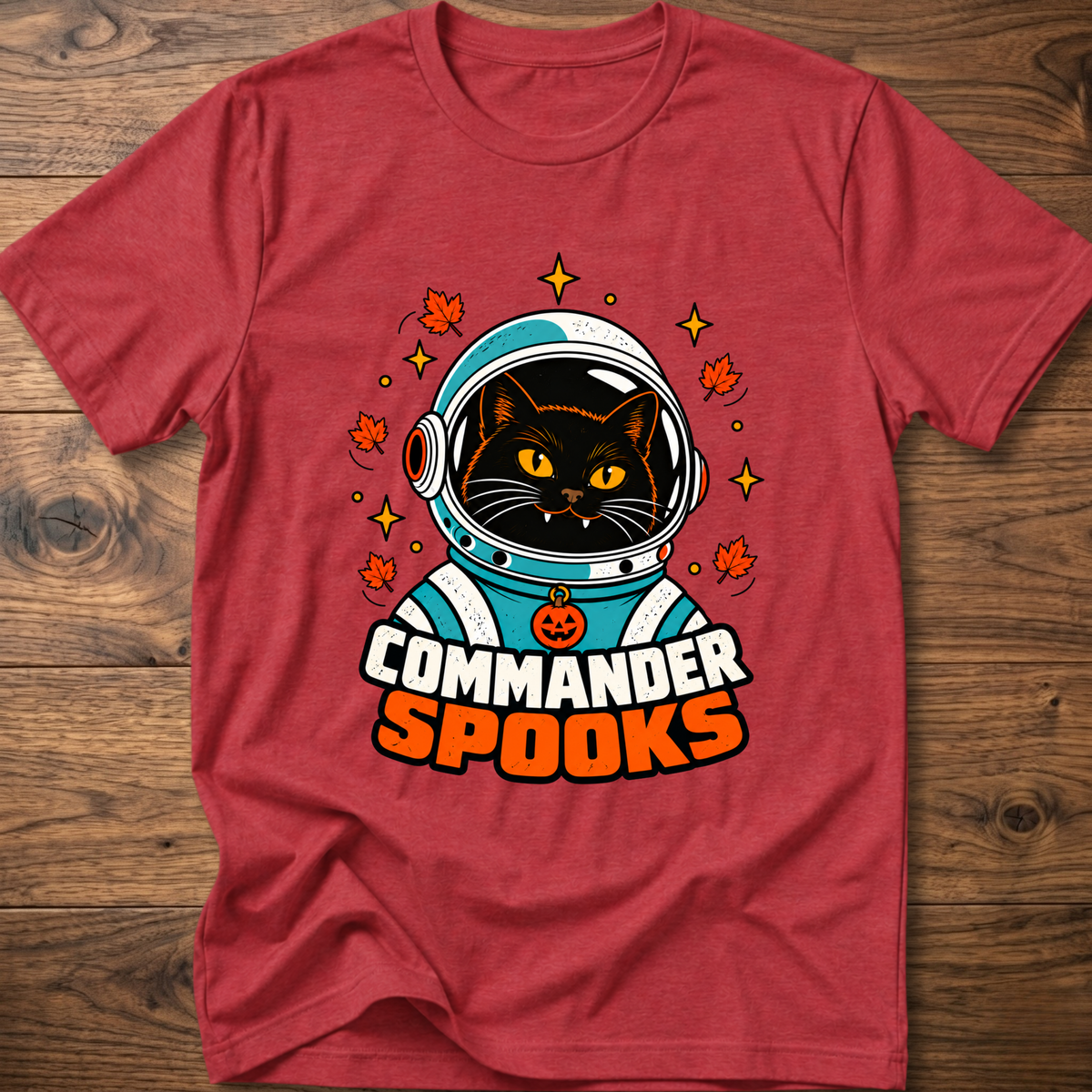 Heather red crew-neck T-shirt with cat astronaut graphic and Halloween leaves.