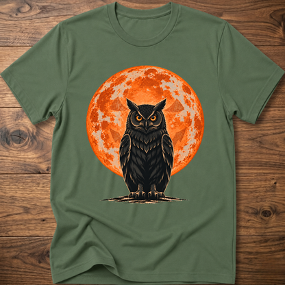 Green T-shirt with owl graphic, orange moon behind, jack-o'-lantern style