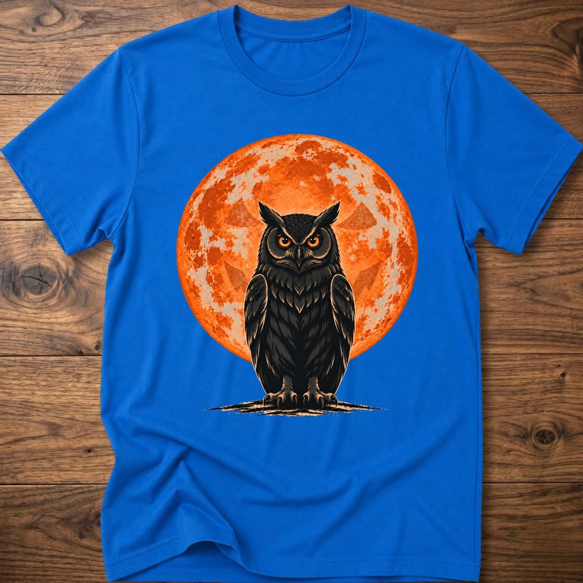 Royal blue T-shirt with owl graphic, orange moon behind, jack-o'-lantern style