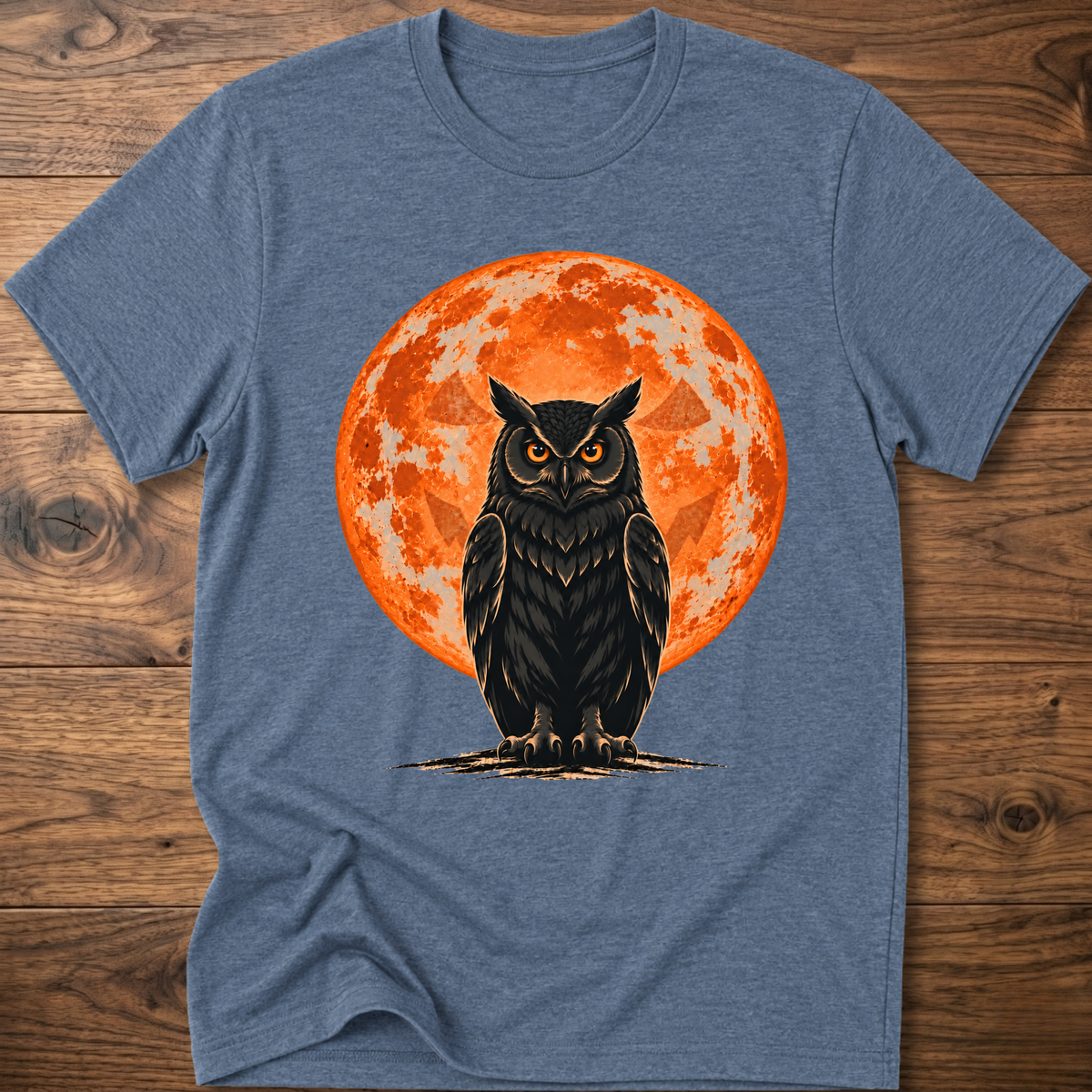 Heather blue T-shirt with owl graphic, orange moon behind, jack-o'-lantern style