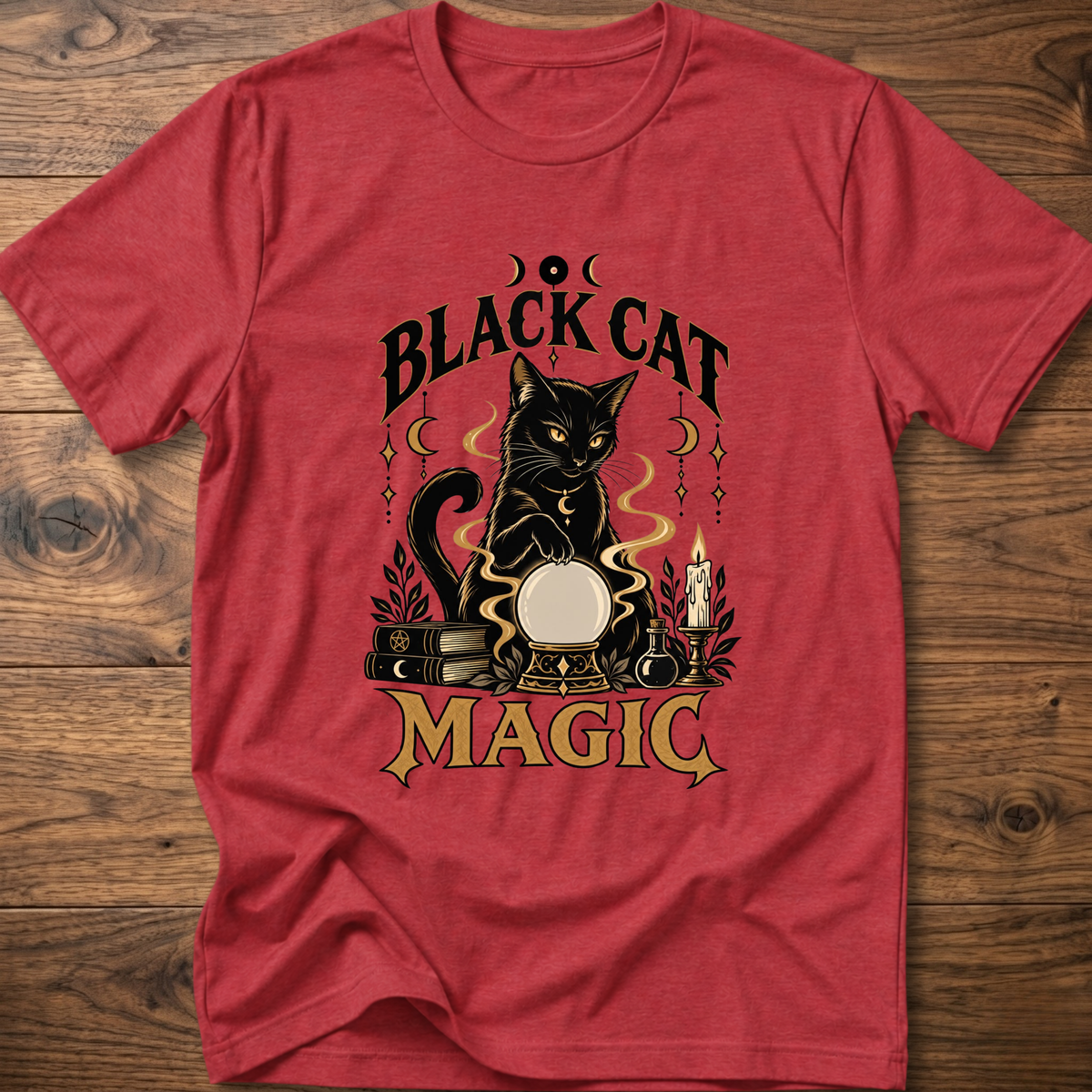 Heather red T-shirt with front graphic of a black cat and “Black Cat Magic” text.