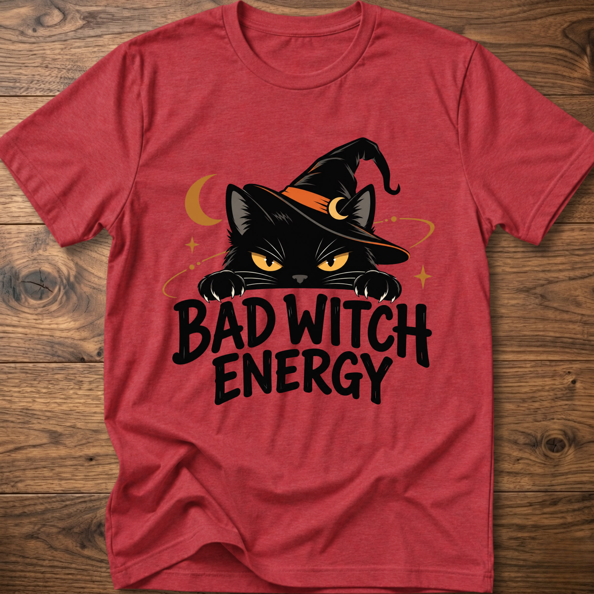 Red crewneck t-shirt with cat witch graphic and "Bad Witch Energy" text