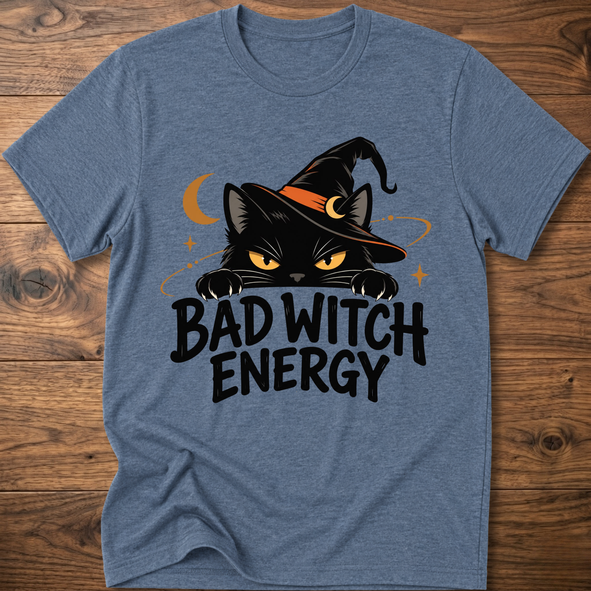 Heather indigo crewneck t-shirt with cat witch graphic and "Bad Witch Energy" text