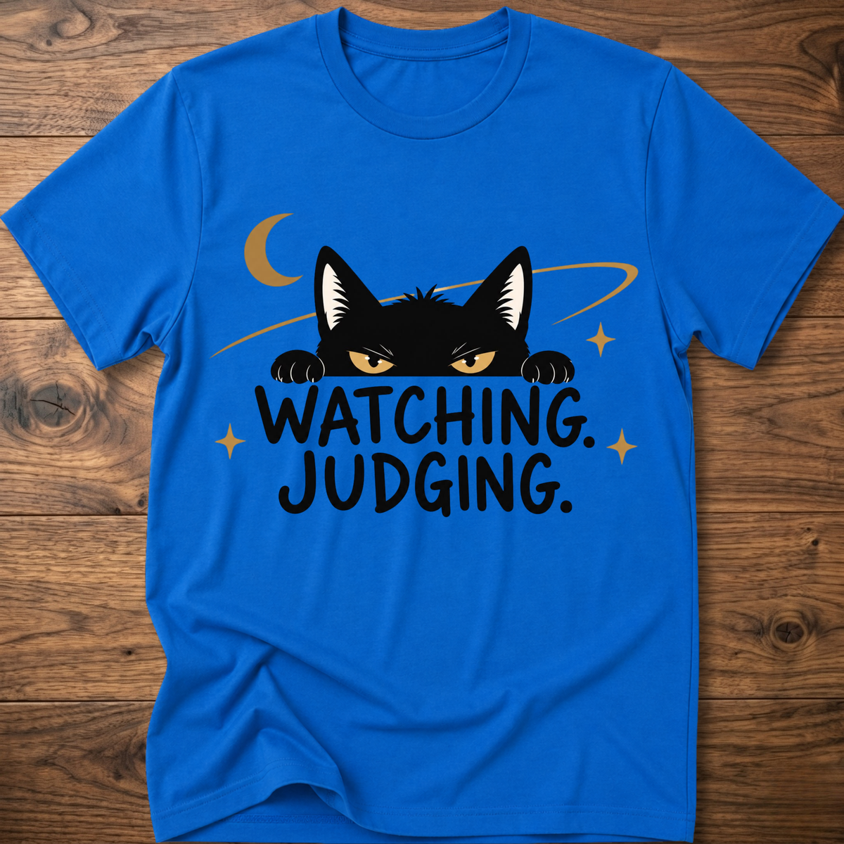 Royal blue crewneck T-shirt with black cat graphic and 'WATCHING JUDGING' text