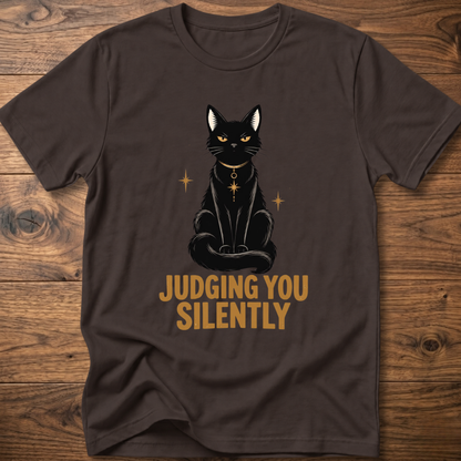 Dark brown t-shirt with black cat graphic and text “JUDGING YOU SILENTLY”