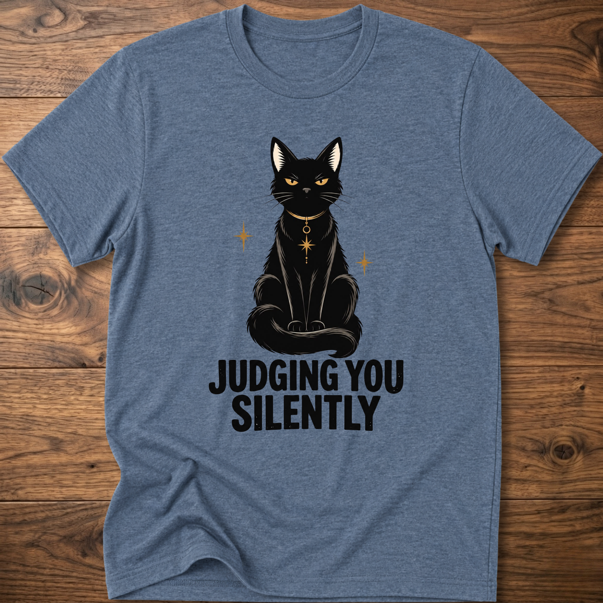 Heather blue t-shirt with black cat graphic and text “JUDGING YOU SILENTLY”