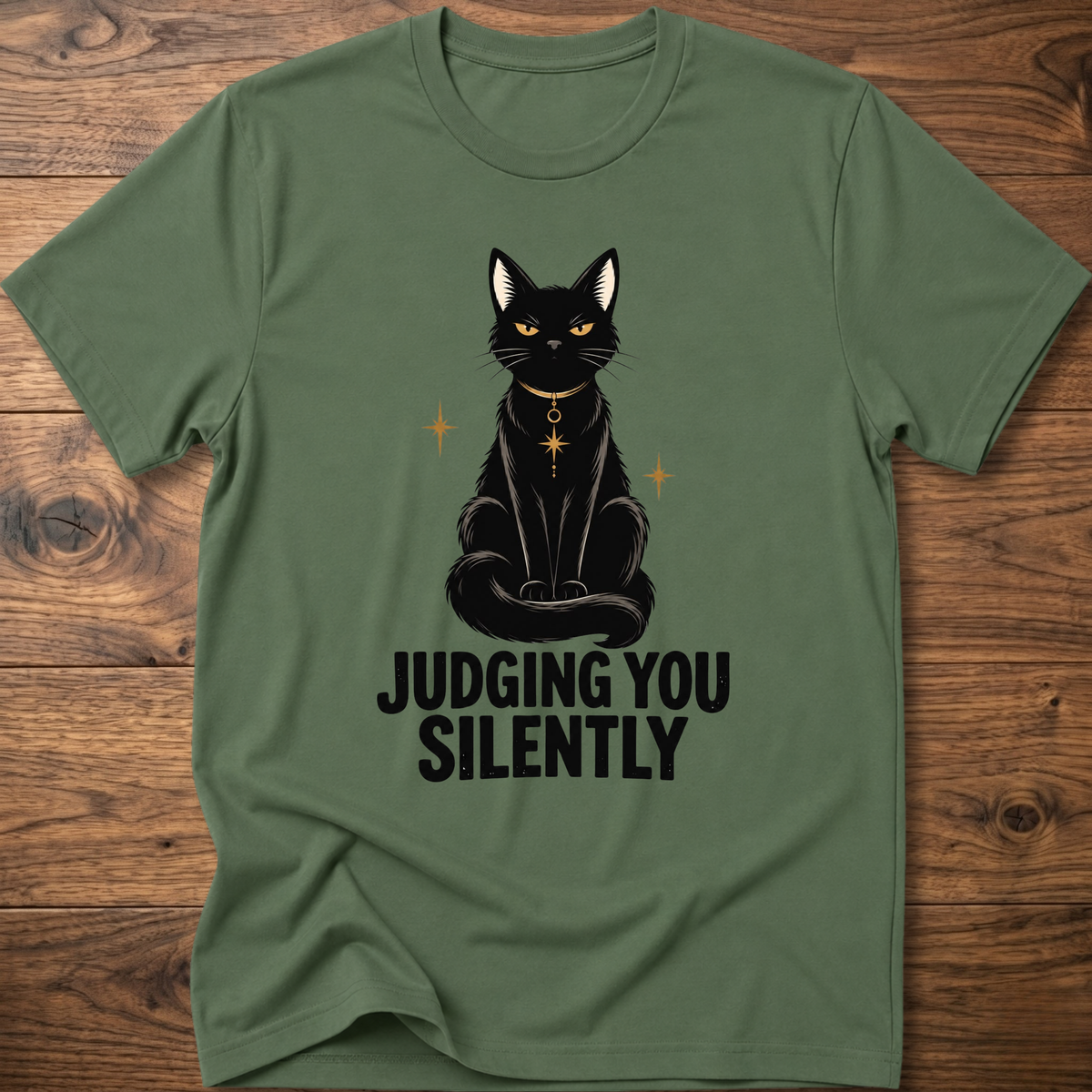 Military green t-shirt with black cat graphic and text “JUDGING YOU SILENTLY”