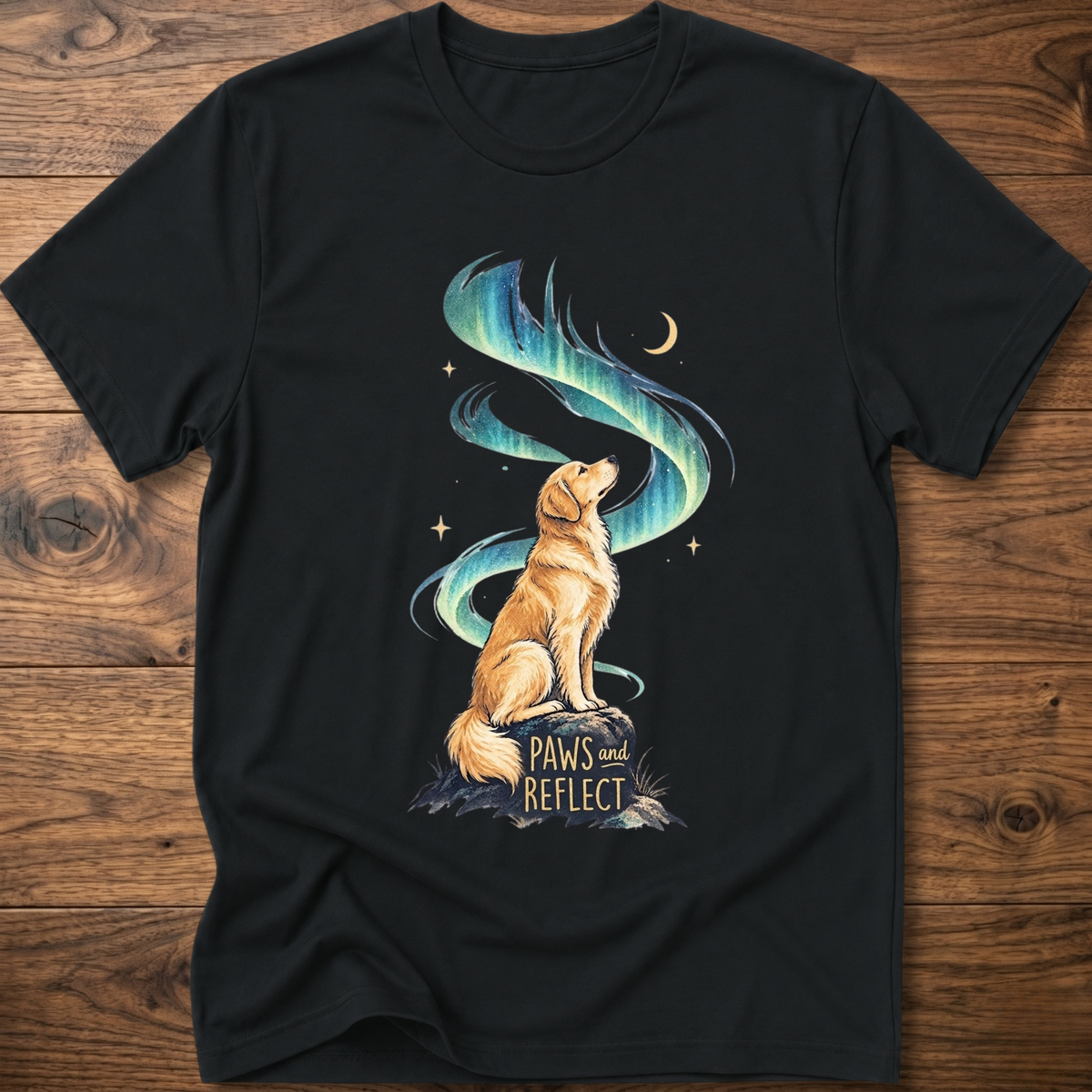Black T-shirt with cat graphic, teal-blue swirl, 'Paws & Reflect' print