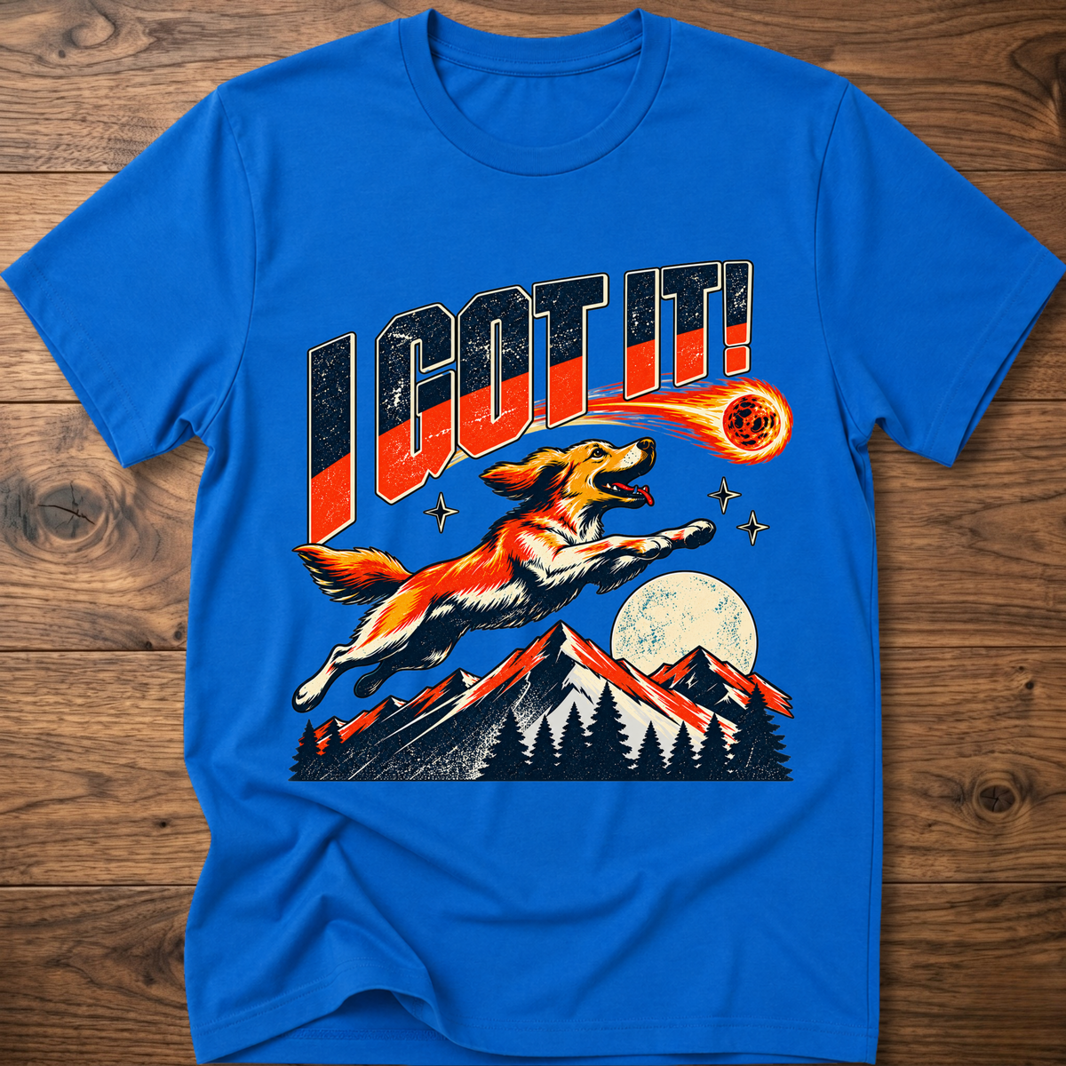 Royal blue T-shirt with 'I GOT IT' retro dog graphic and sunset mountains