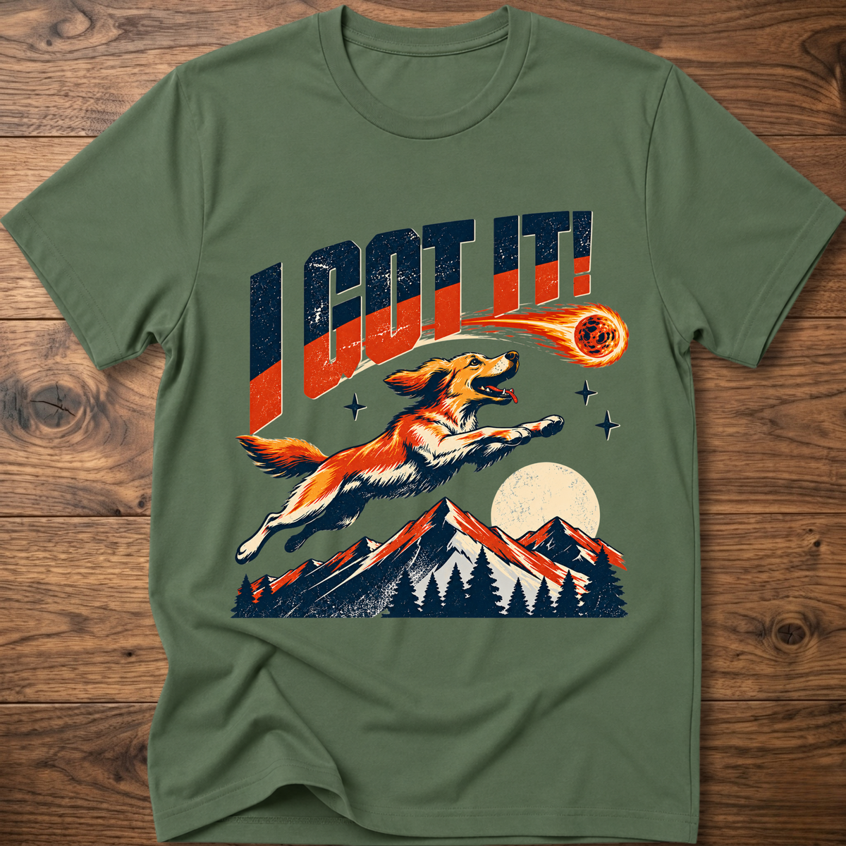 Military green T-shirt with 'I GOT IT' retro dog graphic and sunset mountains