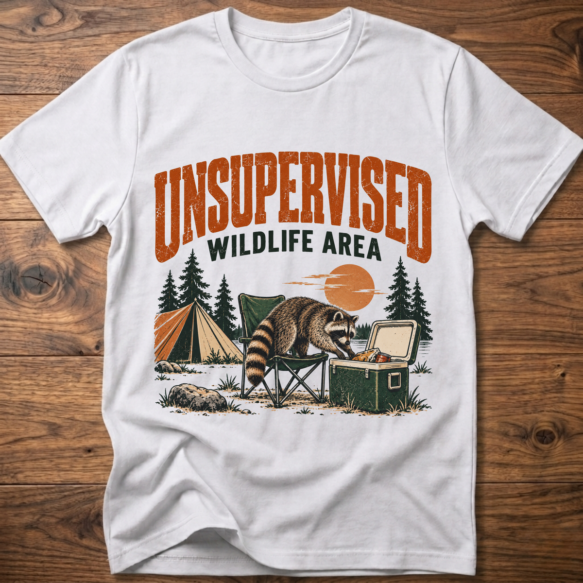White graphic T-shirt with raccoon and “Wildlife Area” illustration