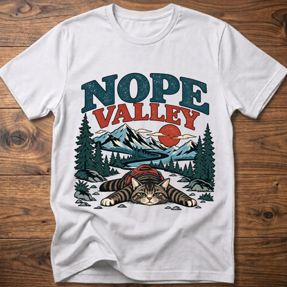White cat T-shirt with Nope Valley mountain forest graphic