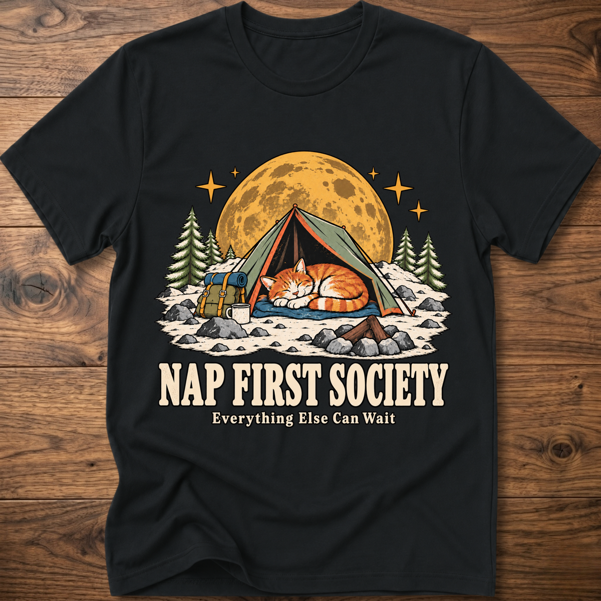 Black crewneck graphic T-shirt with sleeping cat camping tent front print