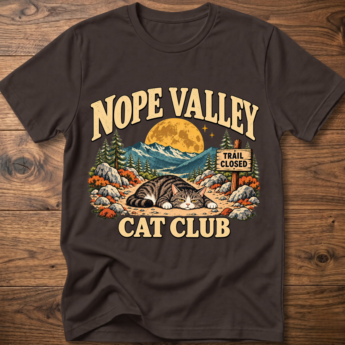 Dark chocolate T-shirt with 'NOPE VALLEY CAT CLUB' cat graphic and trail closed sign