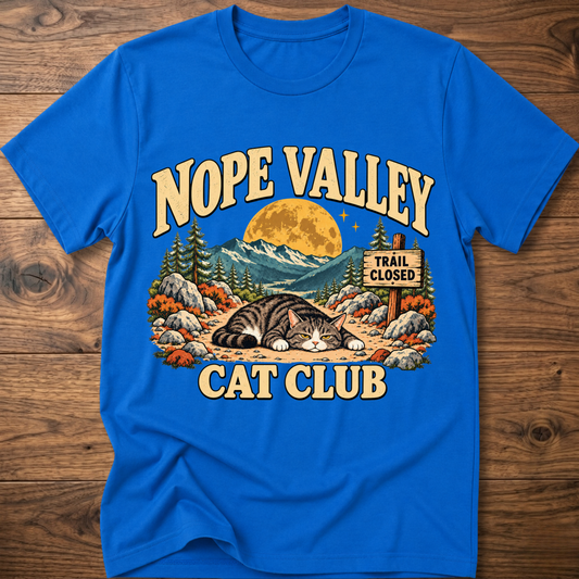 Royal blue T-shirt with 'NOPE VALLEY CAT CLUB' cat graphic and trail closed sign