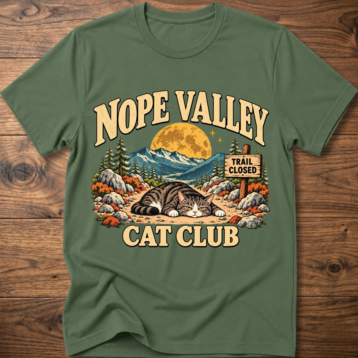 Military green T-shirt with 'NOPE VALLEY CAT CLUB' cat graphic and trail closed sign