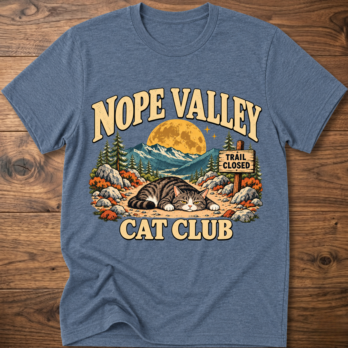 Heather indigo T-shirt with 'NOPE VALLEY CAT CLUB' cat graphic and trail closed sign