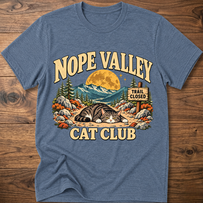Heather indigo T-shirt with 'NOPE VALLEY CAT CLUB' cat graphic and trail closed sign