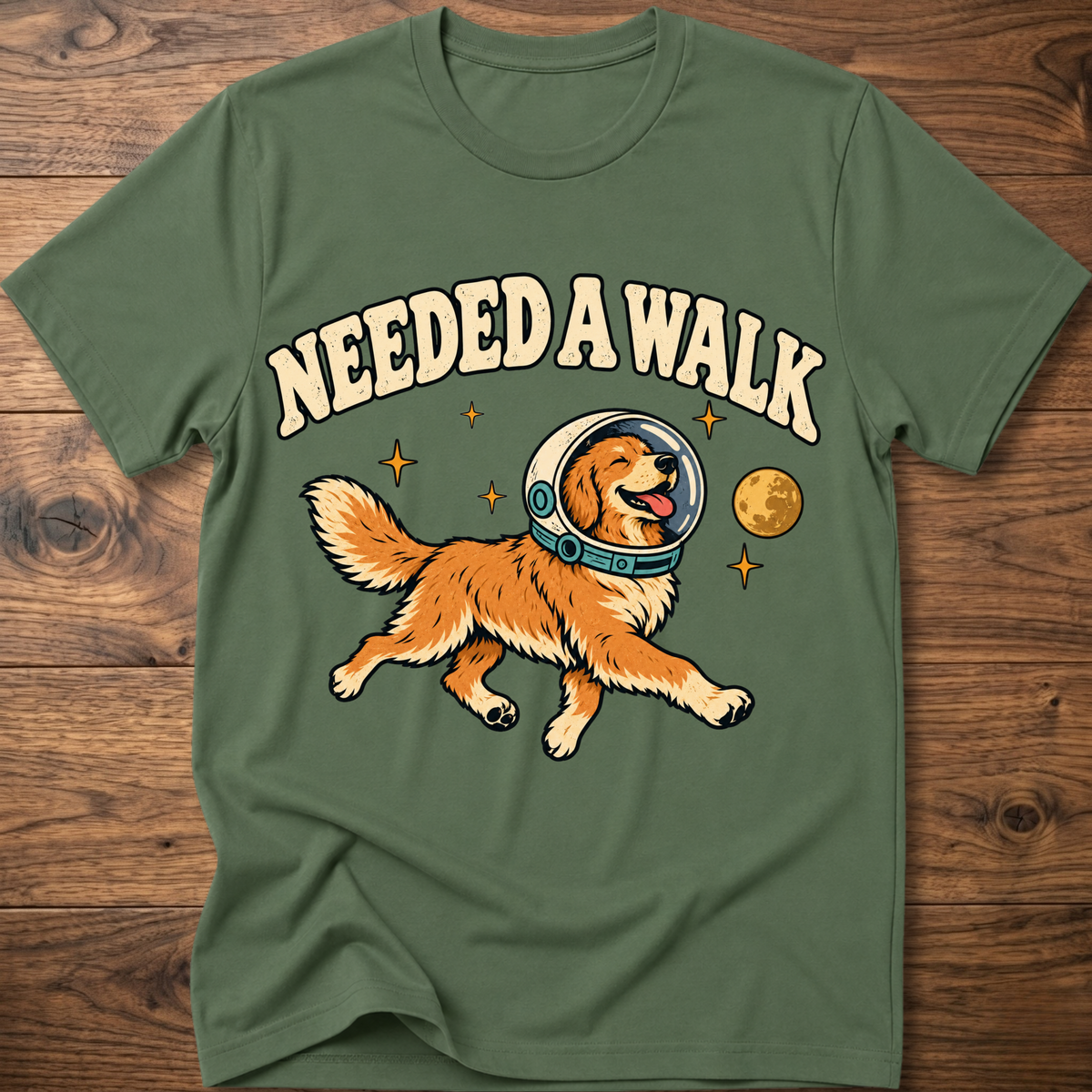 Military green T-shirt with “Needed A Walk” dog-in-helmet graphic on front