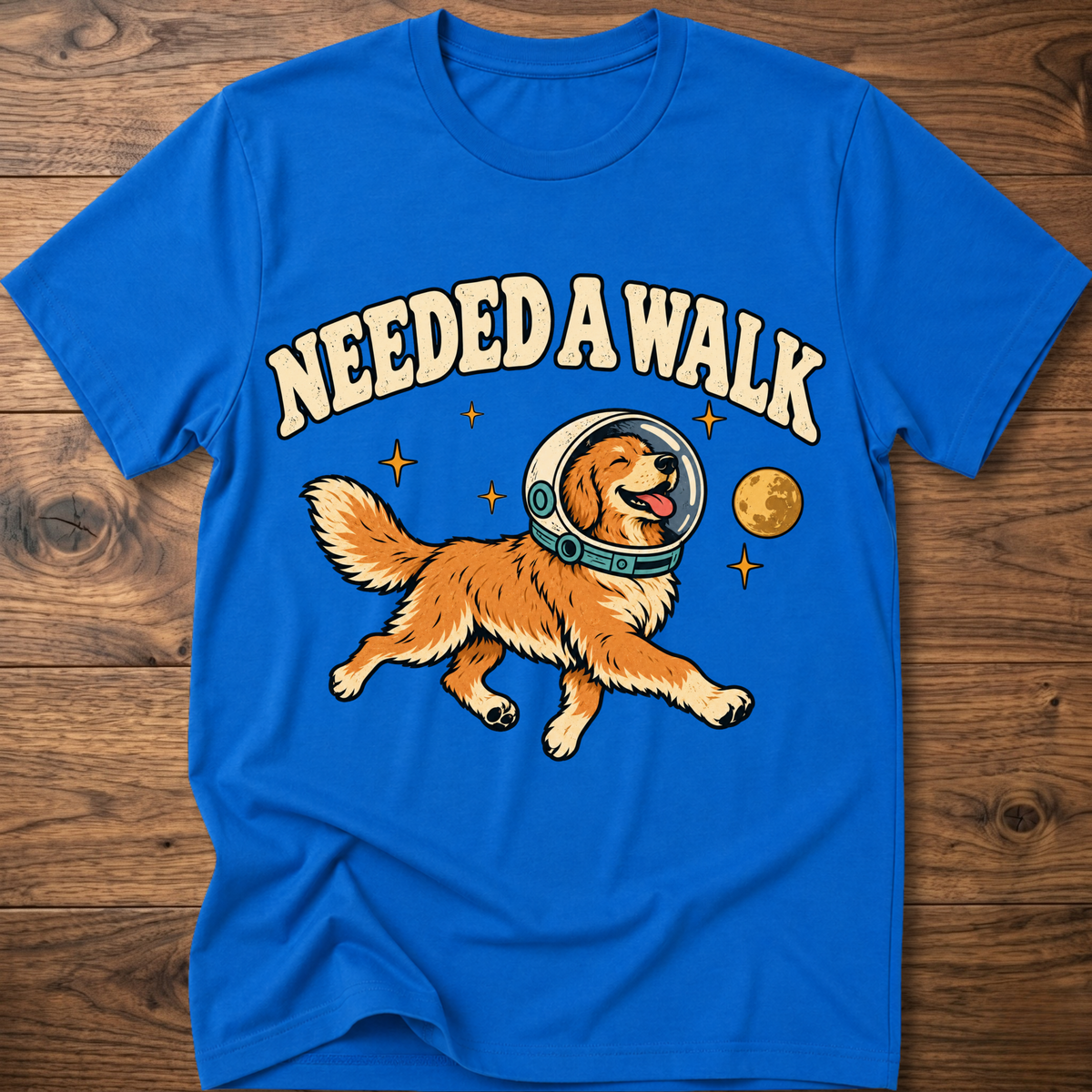 Royal blue T-shirt with “Needed A Walk” dog-in-helmet graphic on front
