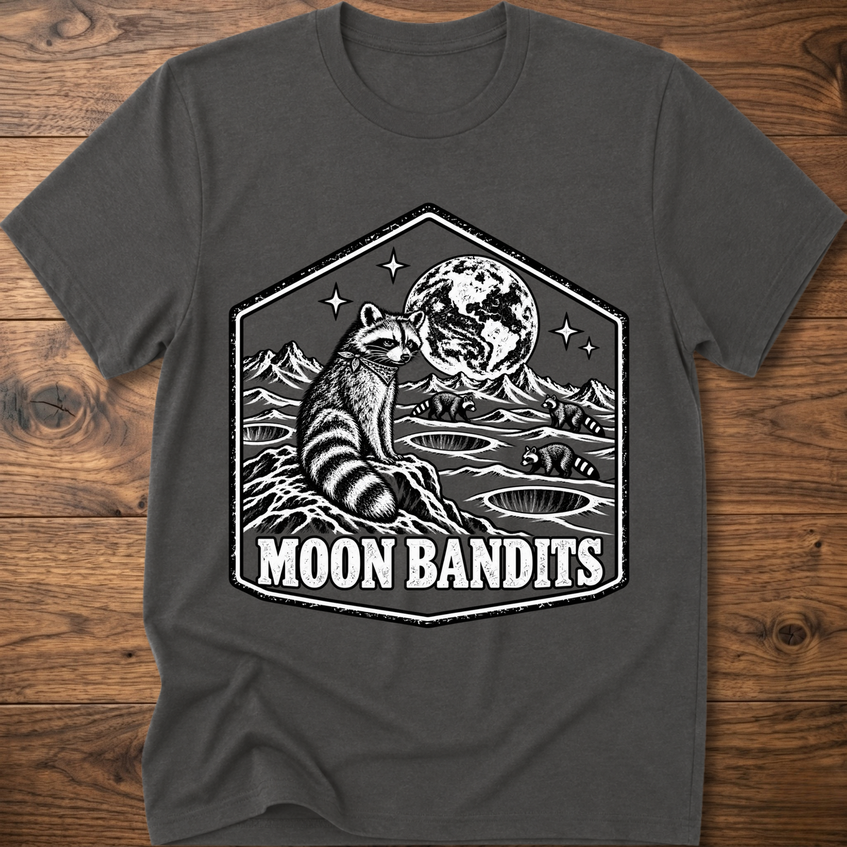 Charcoal Moon Bandits T-shirt with raccoon and full moon landscape graphic