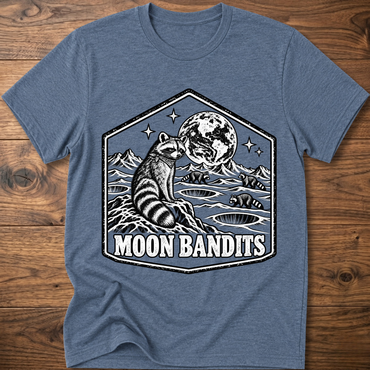 Heather blue Moon Bandits T-shirt with raccoon and full moon landscape graphic