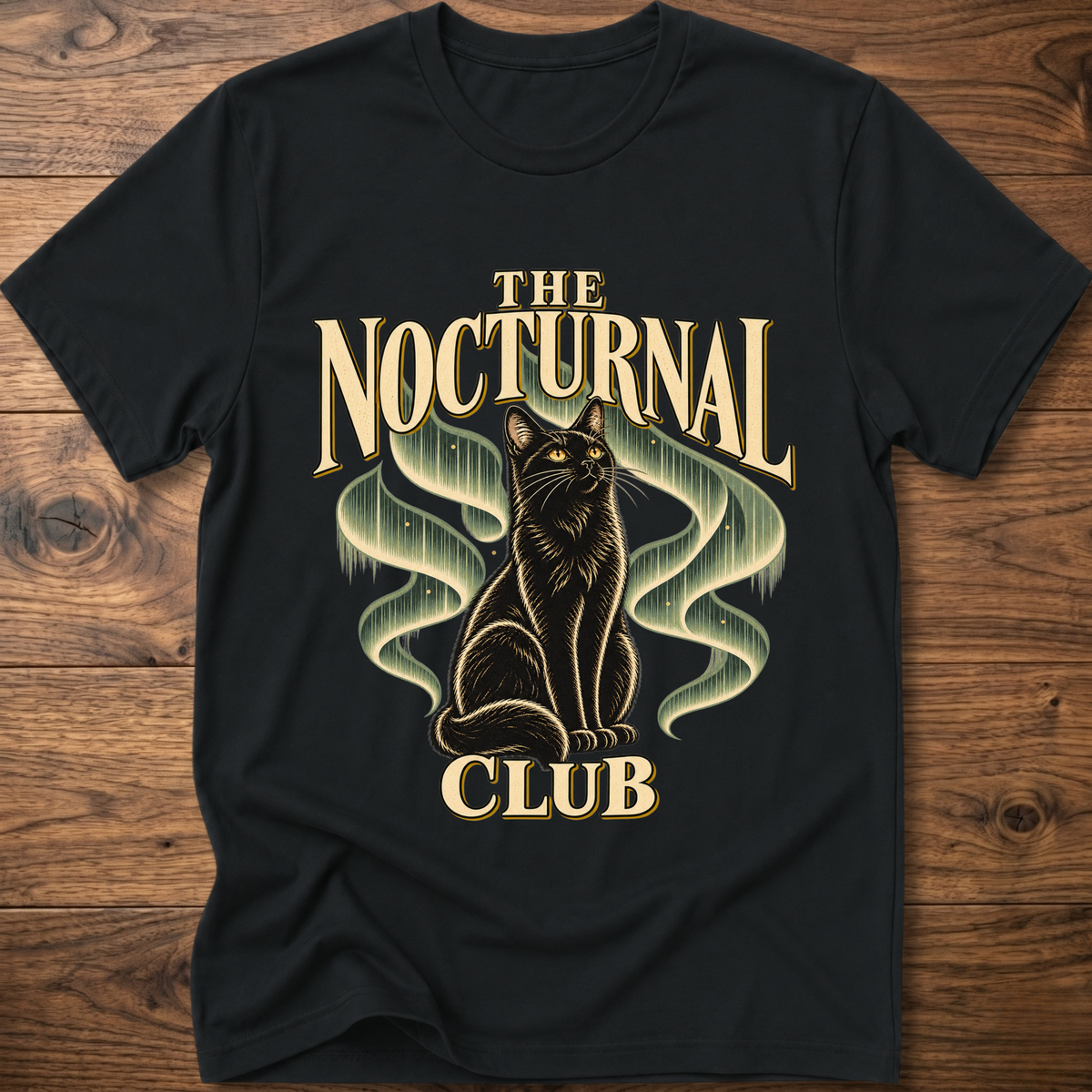 Black T-shirt with “The Nocturnal Club” cat graphic on the front