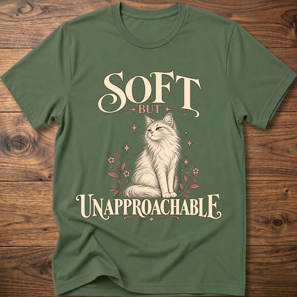 Forest green soft cat T-shirt with front cat graphic and “Soft but Unapproachable” text