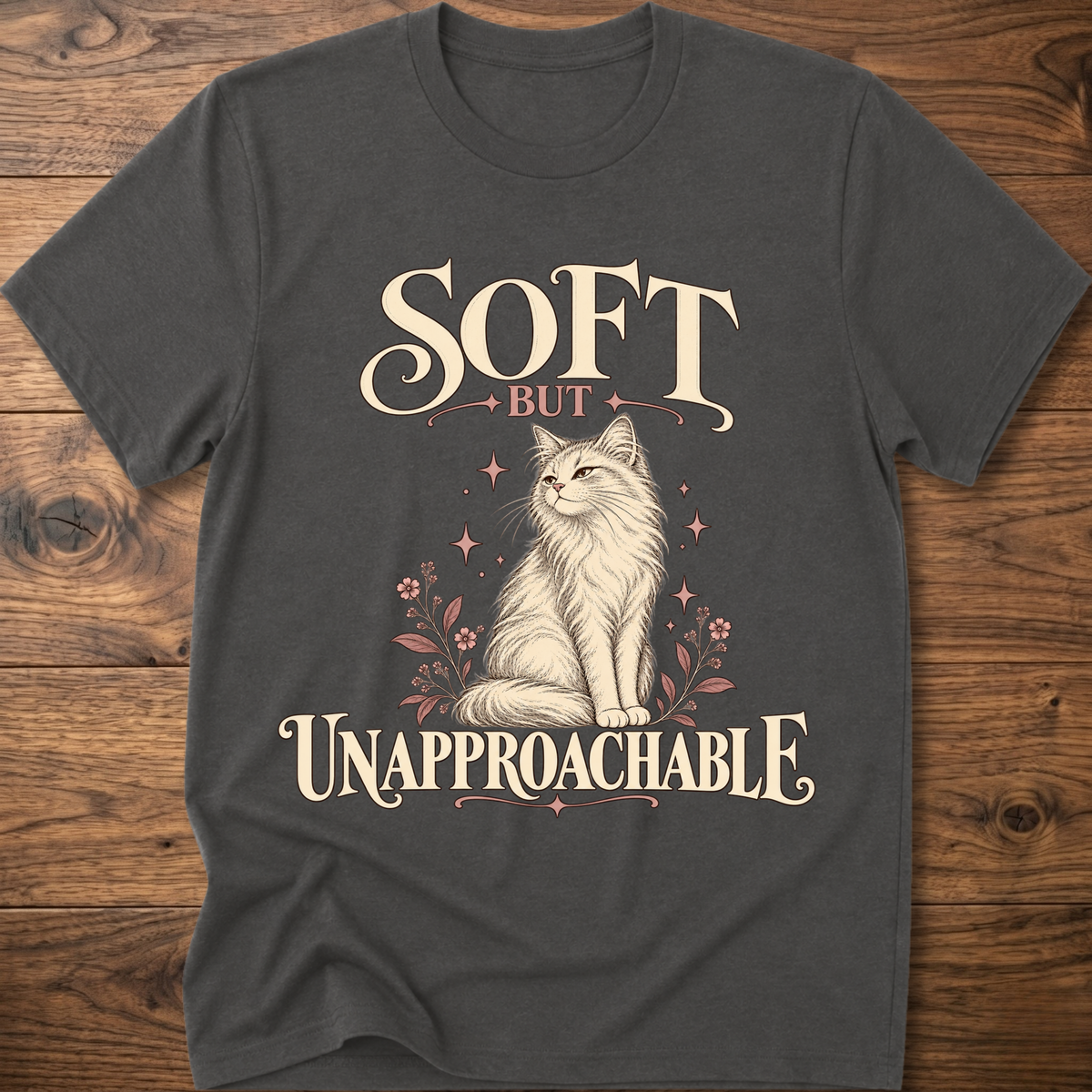 Heather gray soft cat T-shirt with front cat graphic and “Soft but Unapproachable” text