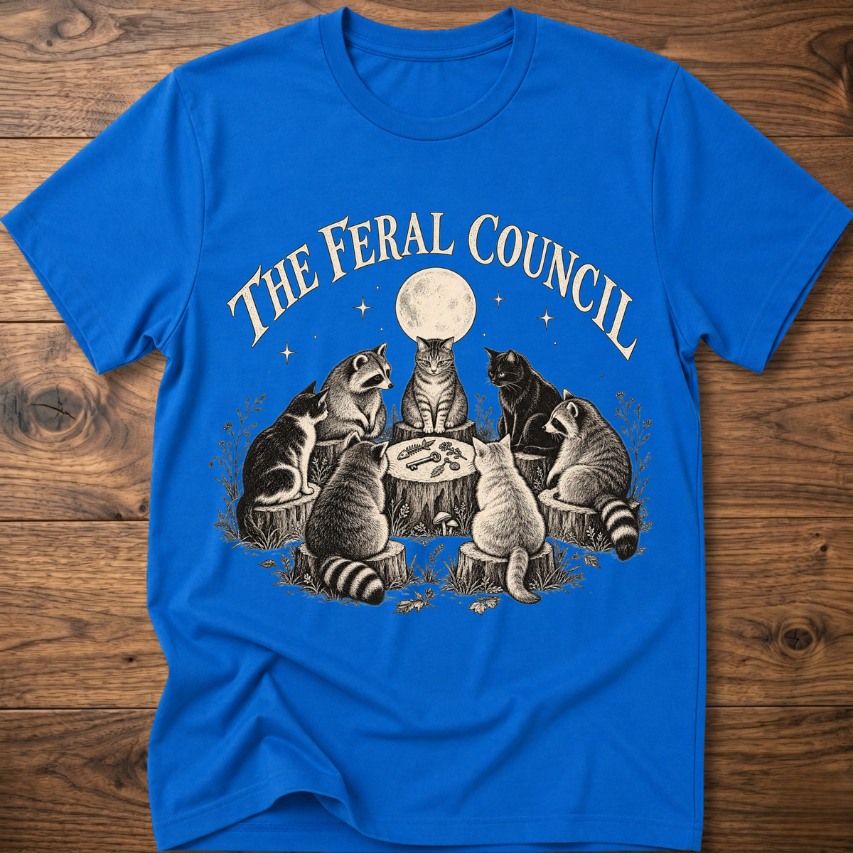 Royal blue graphic cat council T-shirt with moon illustration on front