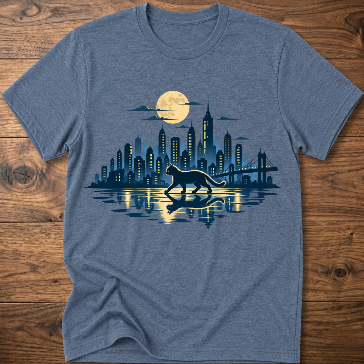 Heather blue short-sleeve T-shirt with cat and city skyline graphic at center
