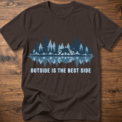 Black crew-neck T-shirt with blue raccoon tree scene graphic and “OUTSIDE IS THE BEST SIDE” text