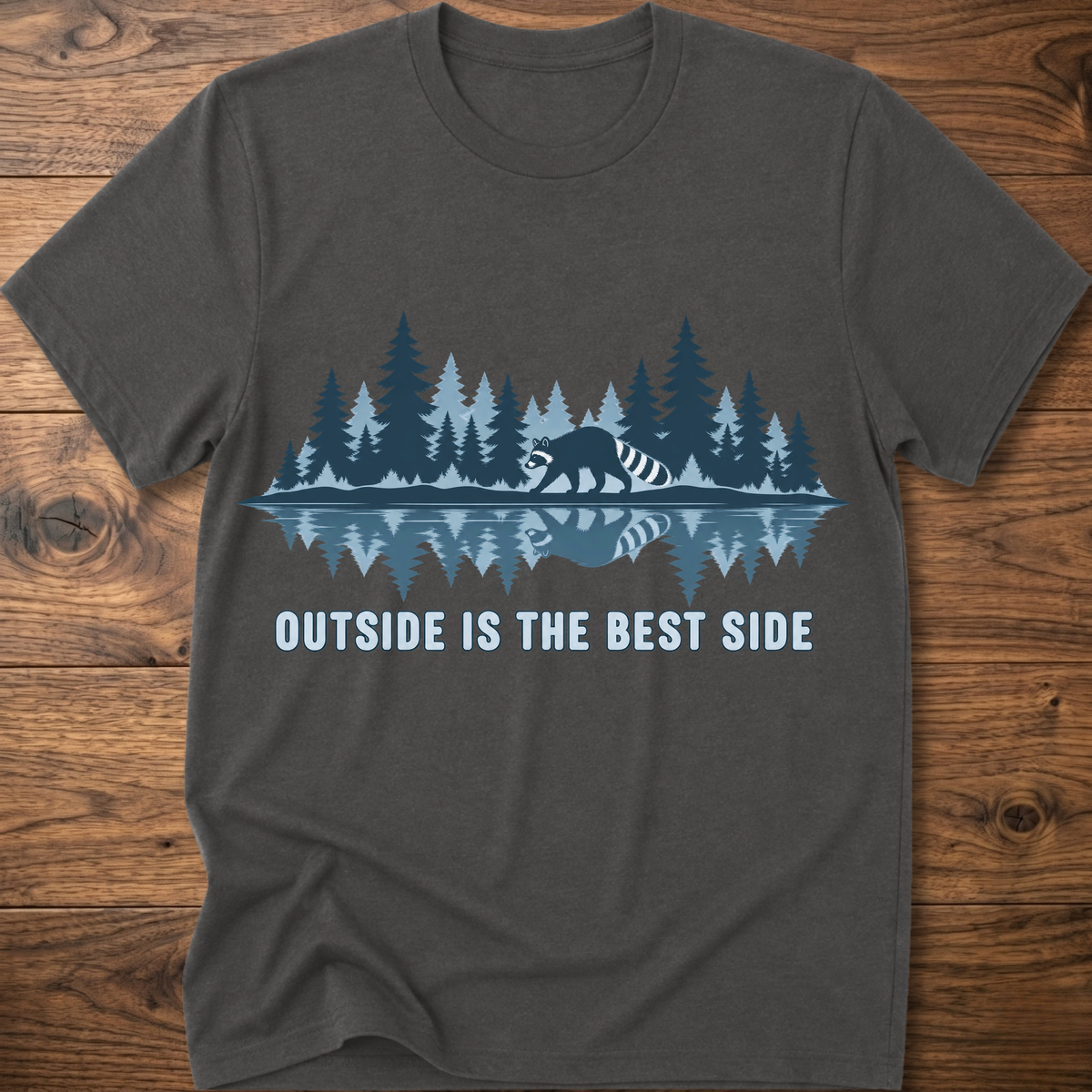 Dark gray crew-neck T-shirt with blue raccoon tree scene graphic and “OUTSIDE IS THE BEST SIDE” text