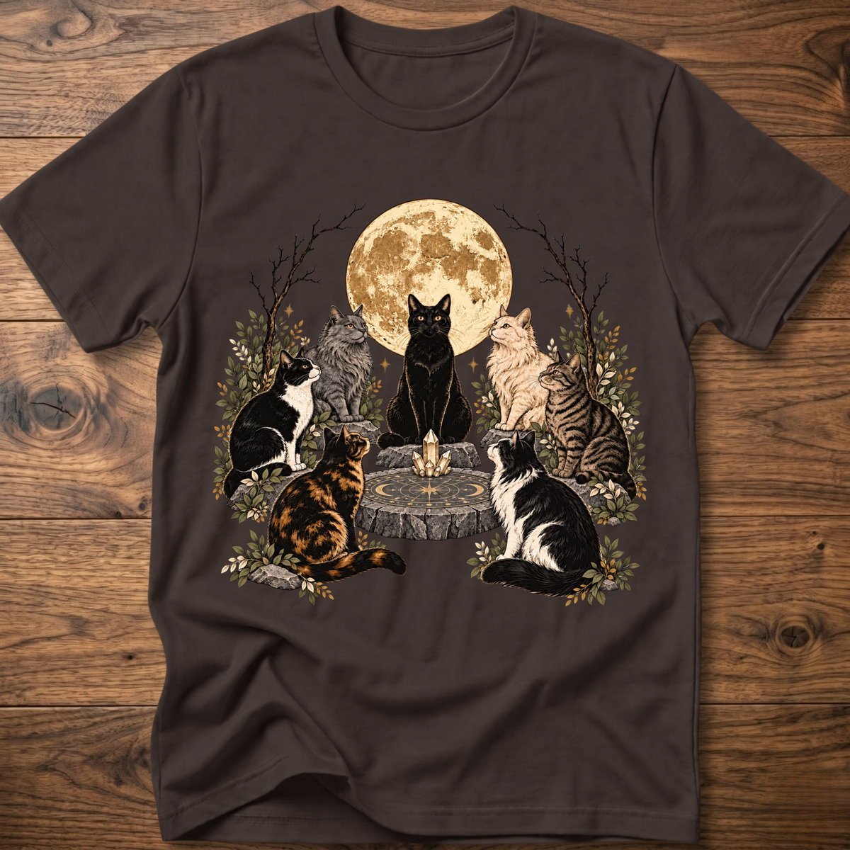 Dark brown crew-neck t-shirt with illustrated cats and full moon graphic