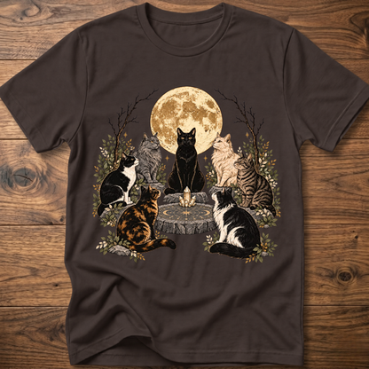 Dark brown crew-neck t-shirt with illustrated cats and full moon graphic